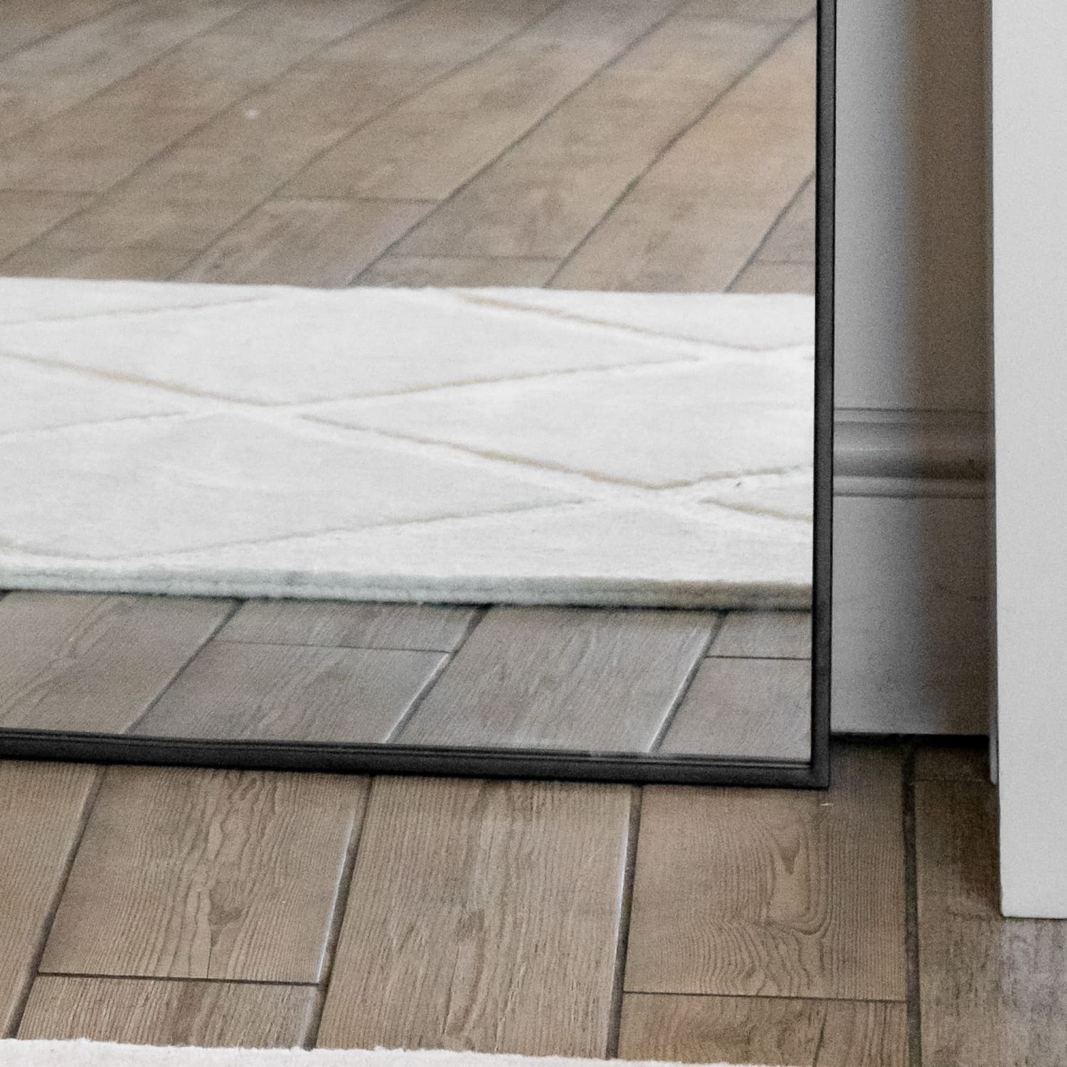 White memory foam bath mat with a textured diamond pattern.