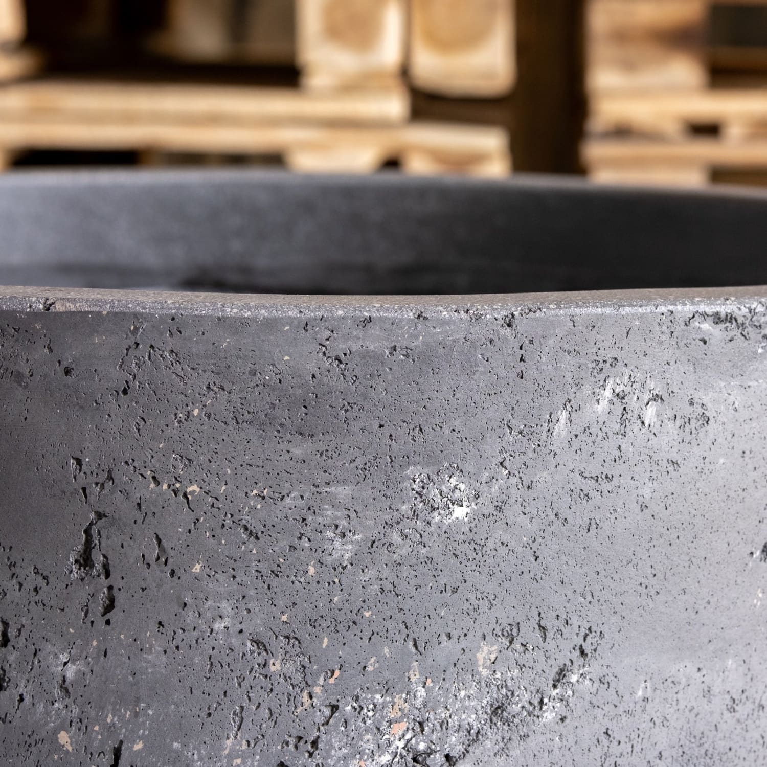 Textured gray concrete planter.