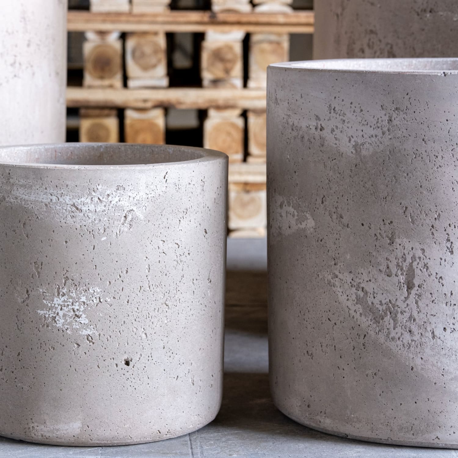 Cylindrical concrete planters.