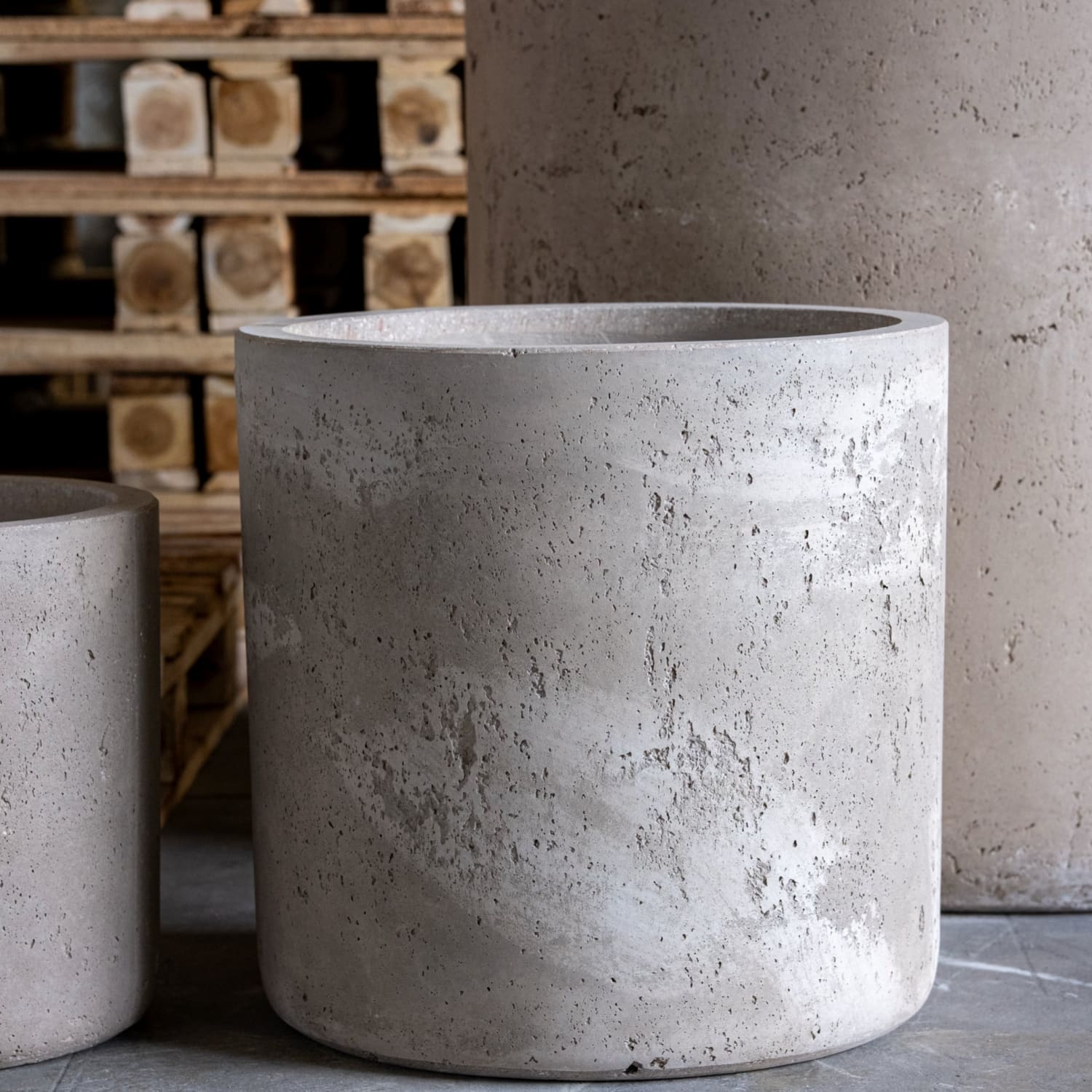 Cylindrical concrete planters.