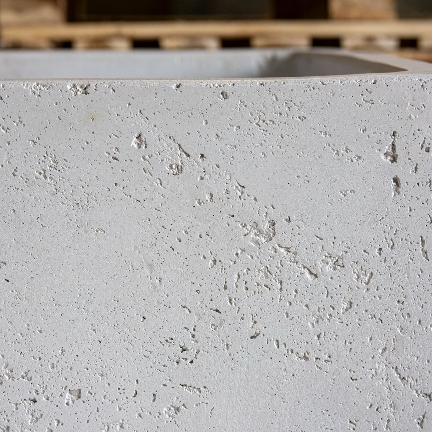 Textured gray concrete planter.