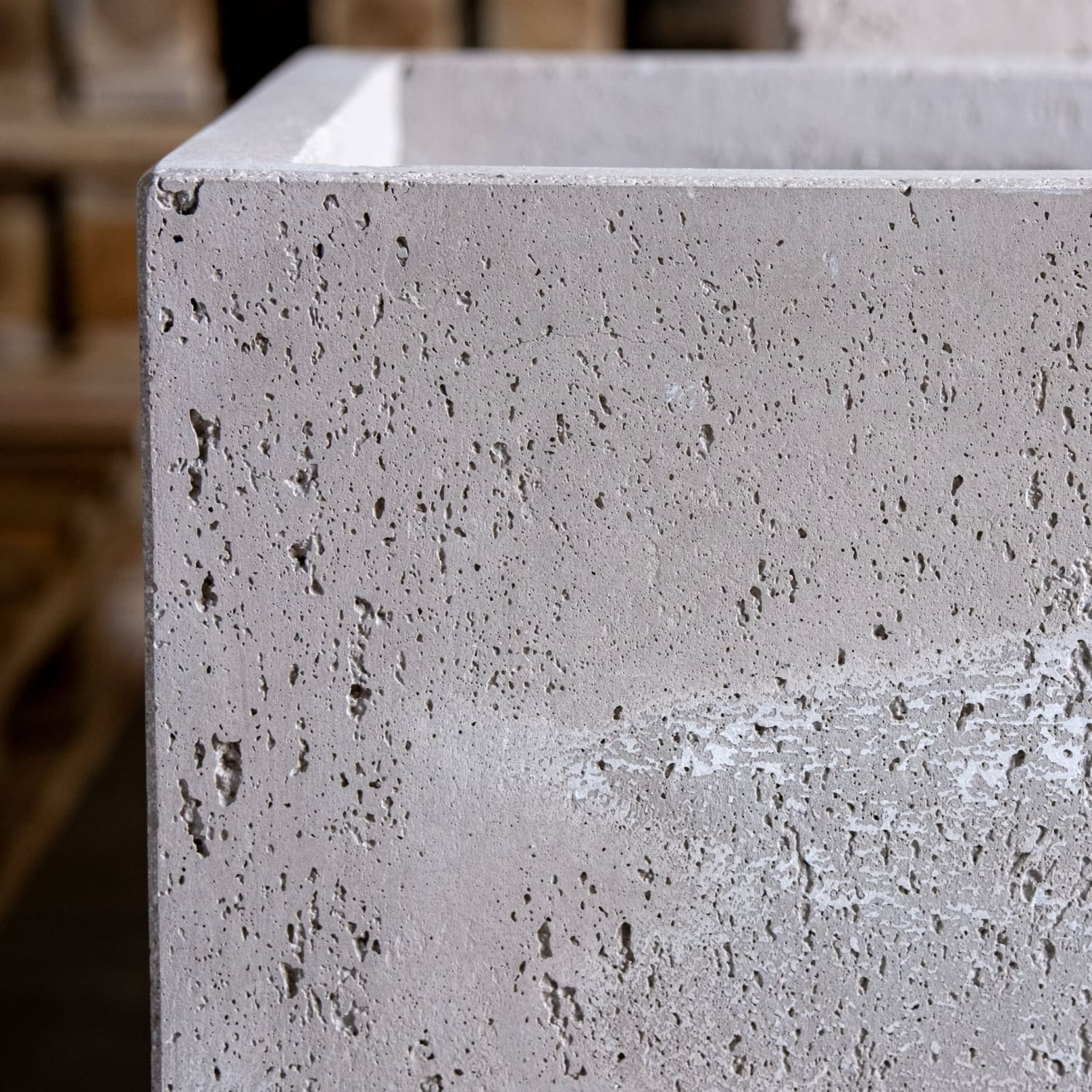 Textured gray concrete planter.