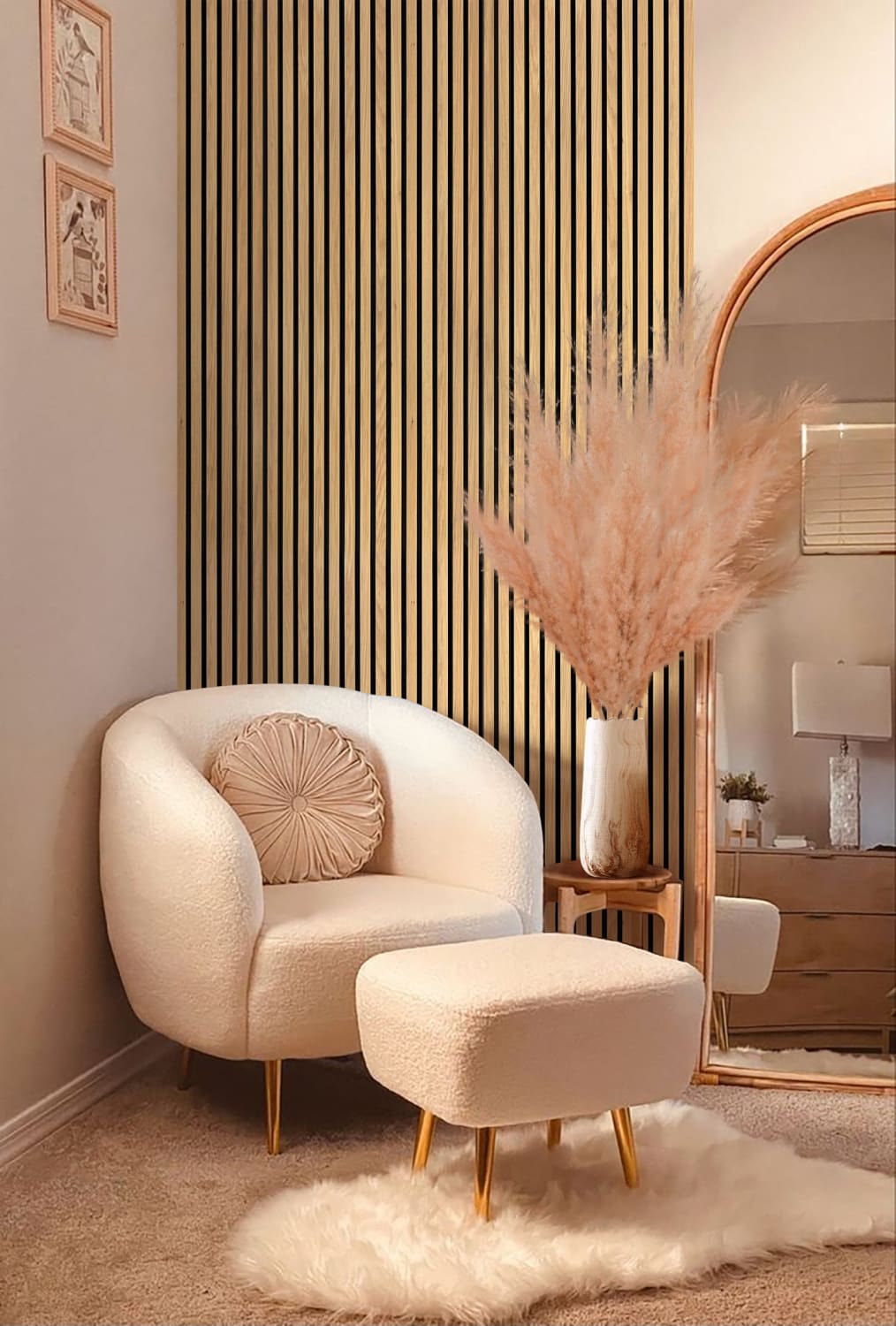 Cream-colored barrel chair with matching ottoman on gold legs.