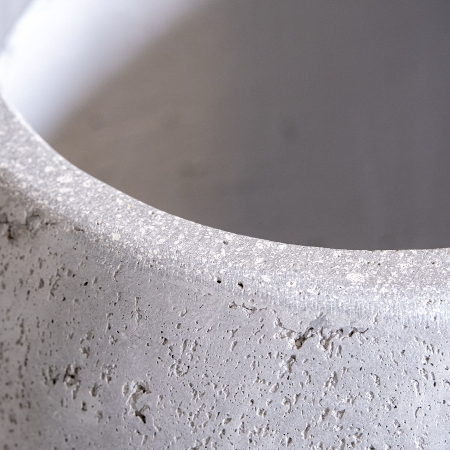 Textured gray concrete pot.