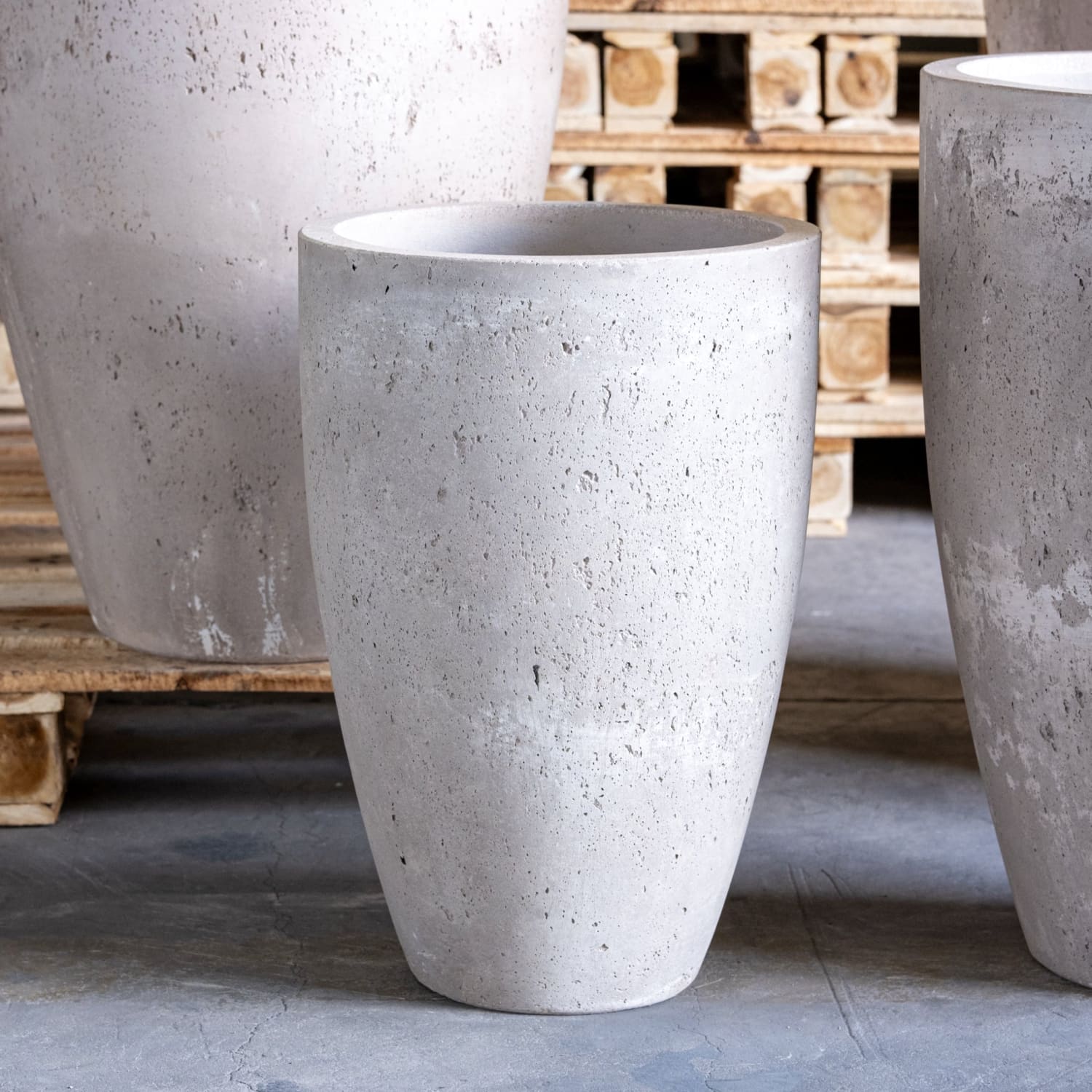 Textured gray concrete planter.