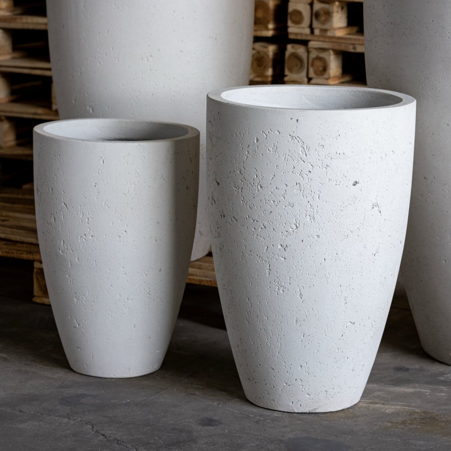 White textured concrete planters.