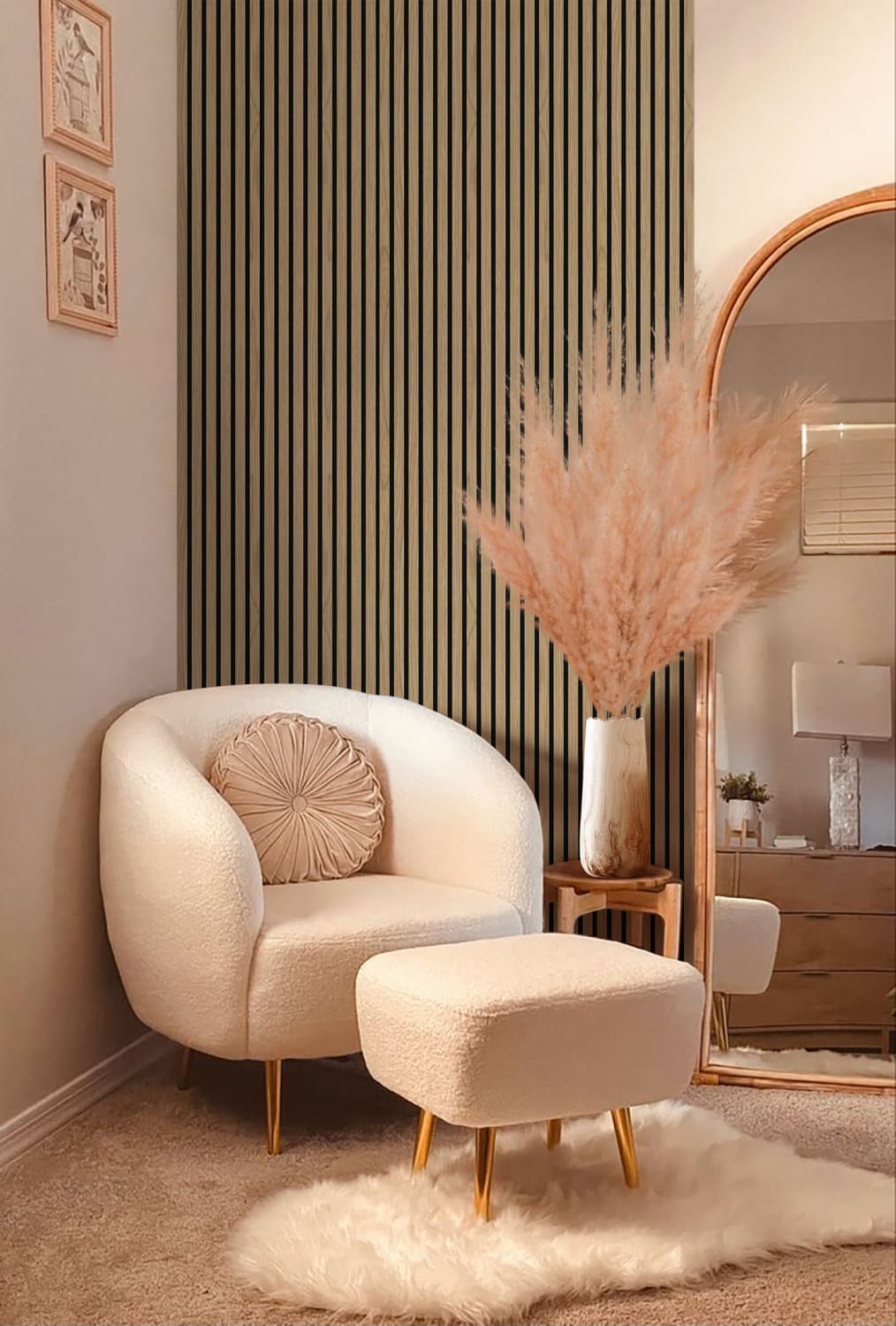 Cream-colored barrel chair with matching ottoman on gold legs.