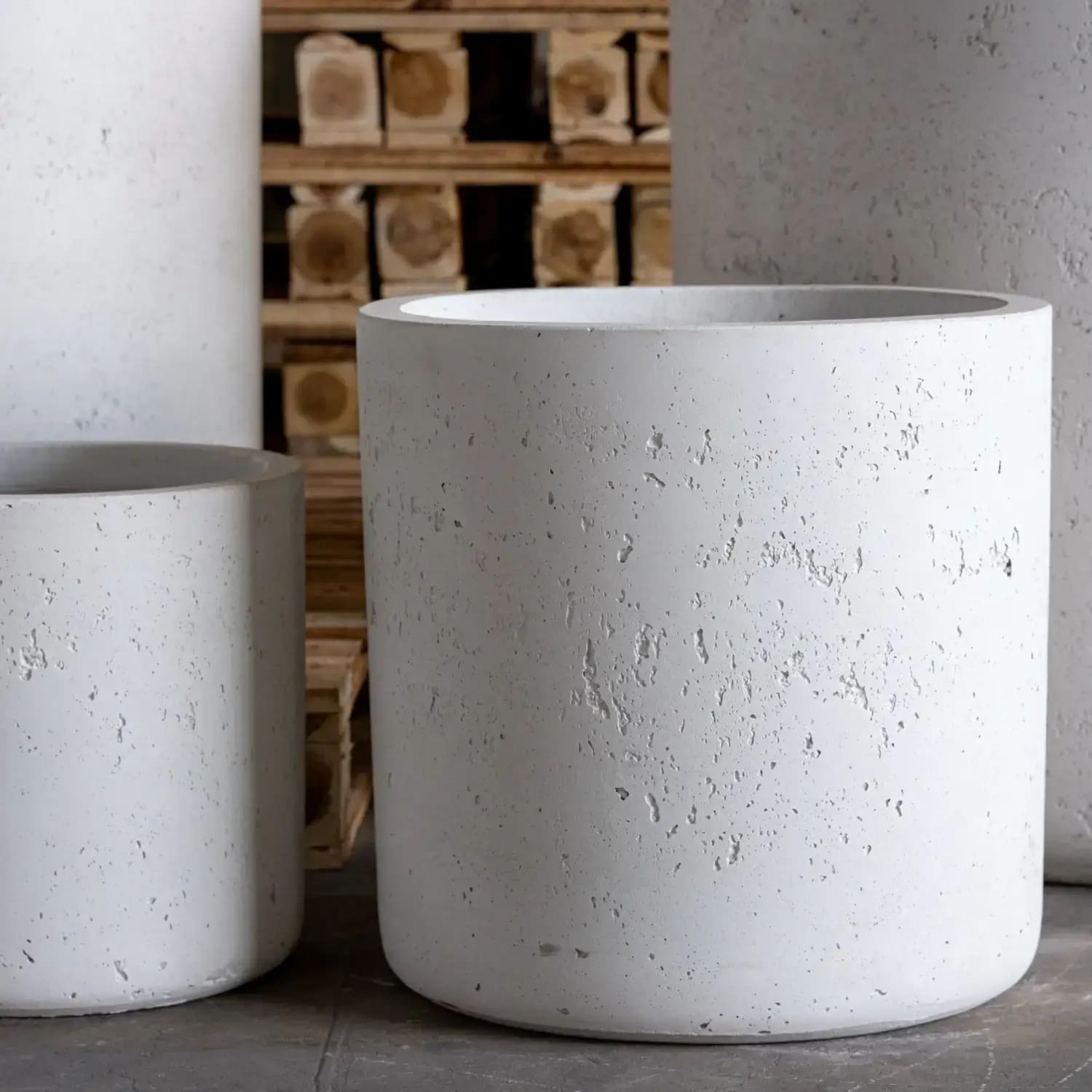 Textured white concrete planters.