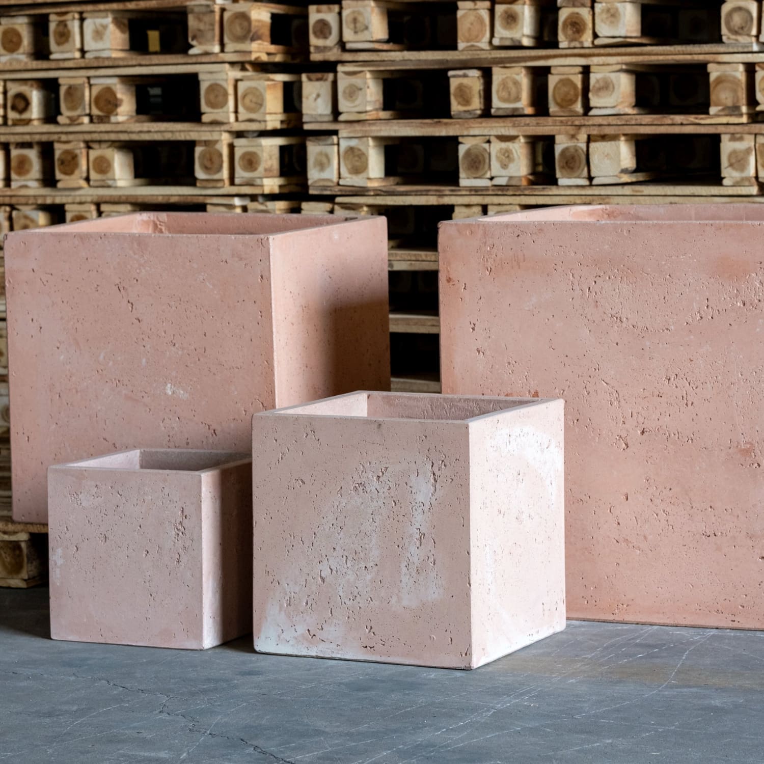 Four square terracotta planters.