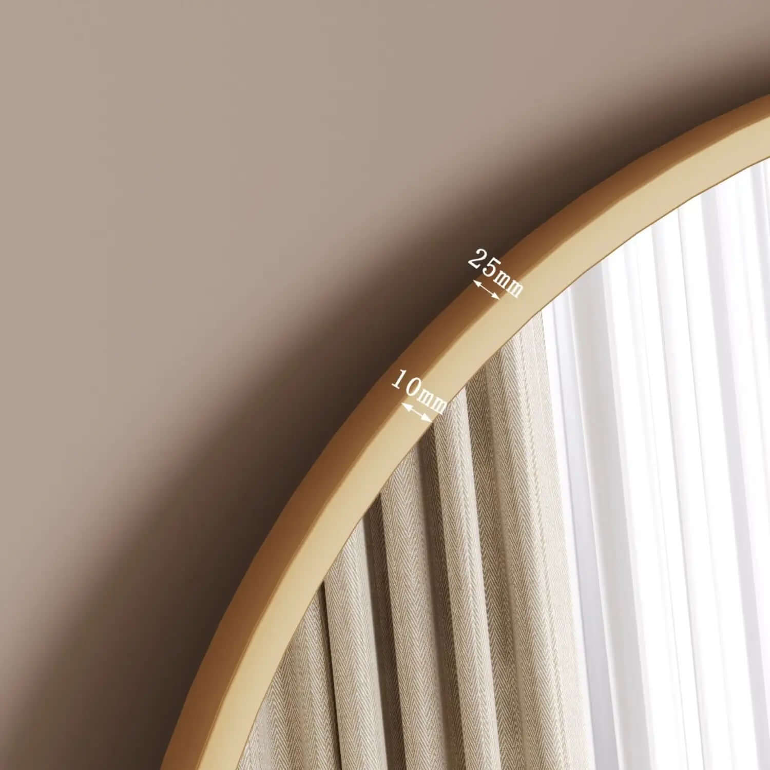 Curved wooden embroidery hoop with measurement markings.