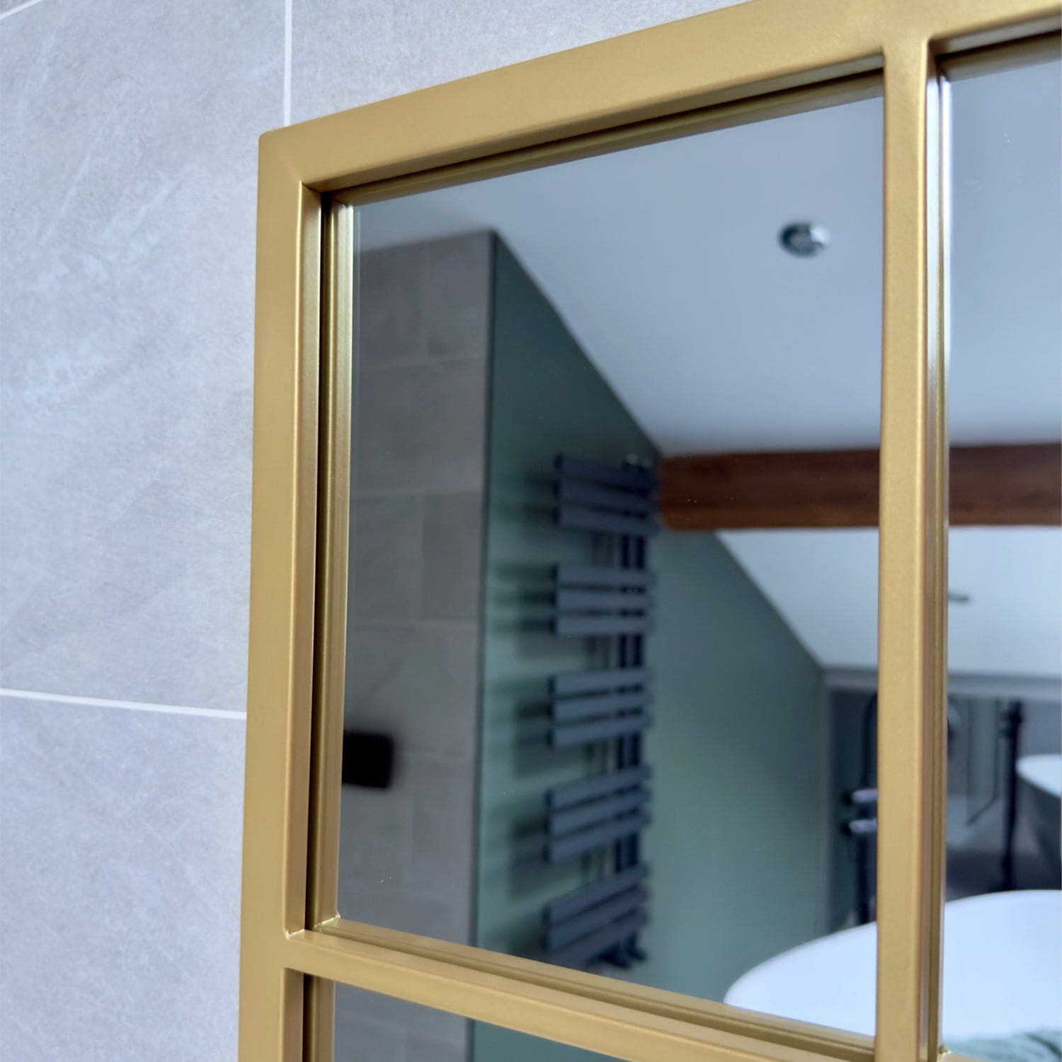 Gold-framed mirror.
