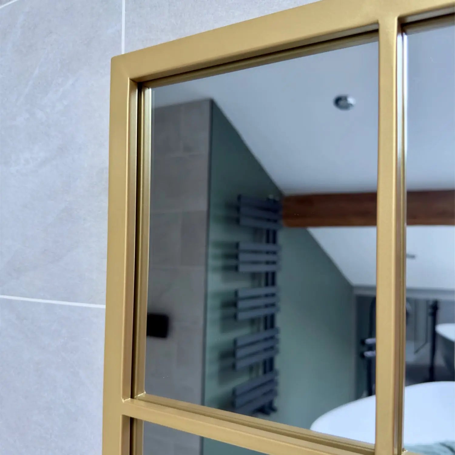 Gold-framed mirror.