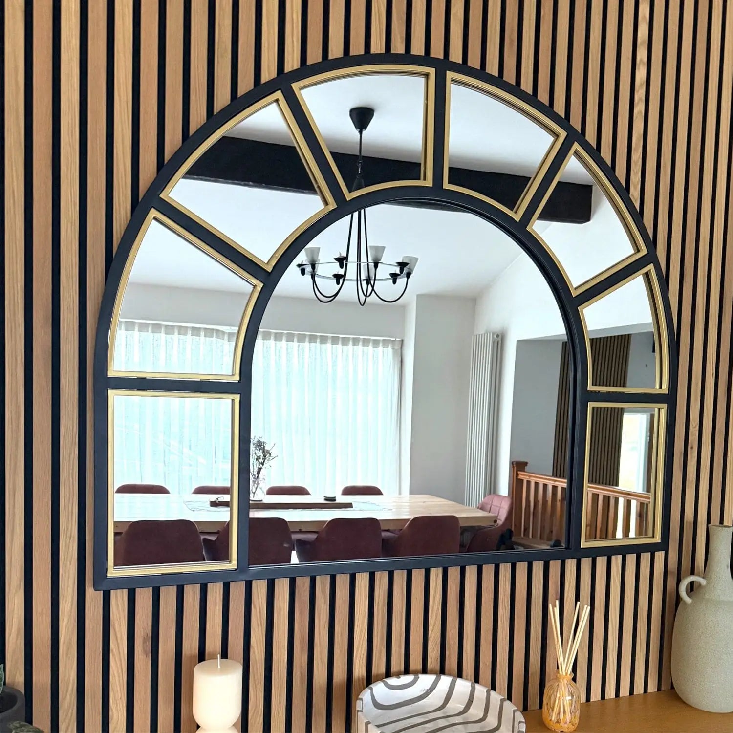 Mio 95x120 black and gold arched window mirror styled in bedroom