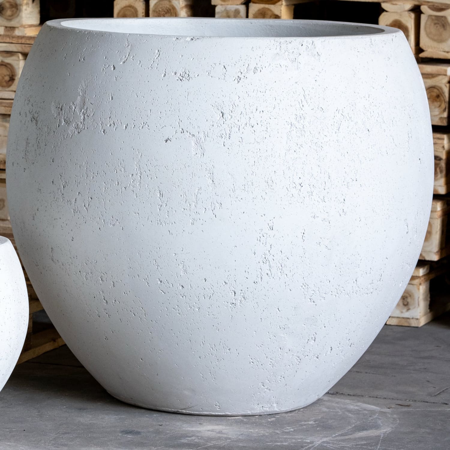 Textured, round, white planter.