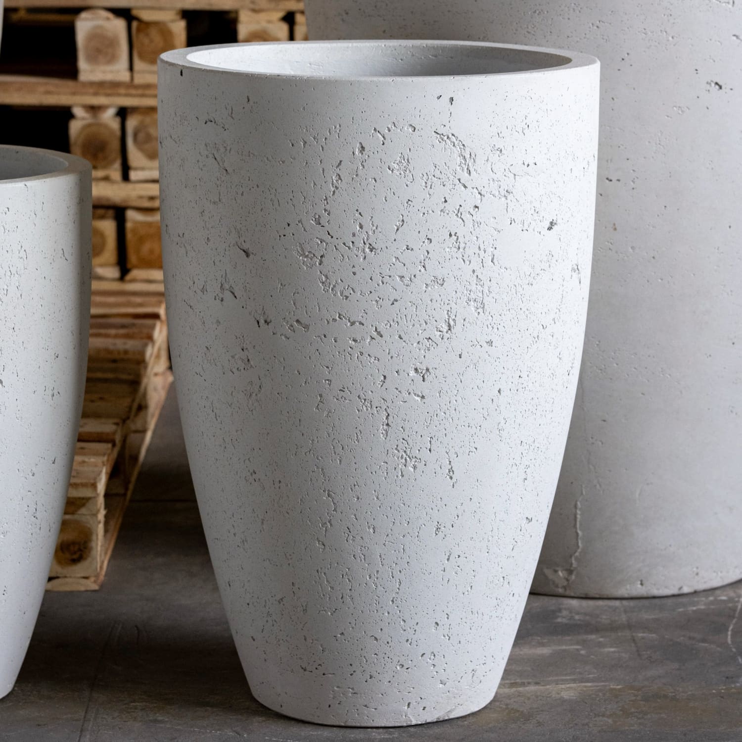 Tall, textured, gray planter.